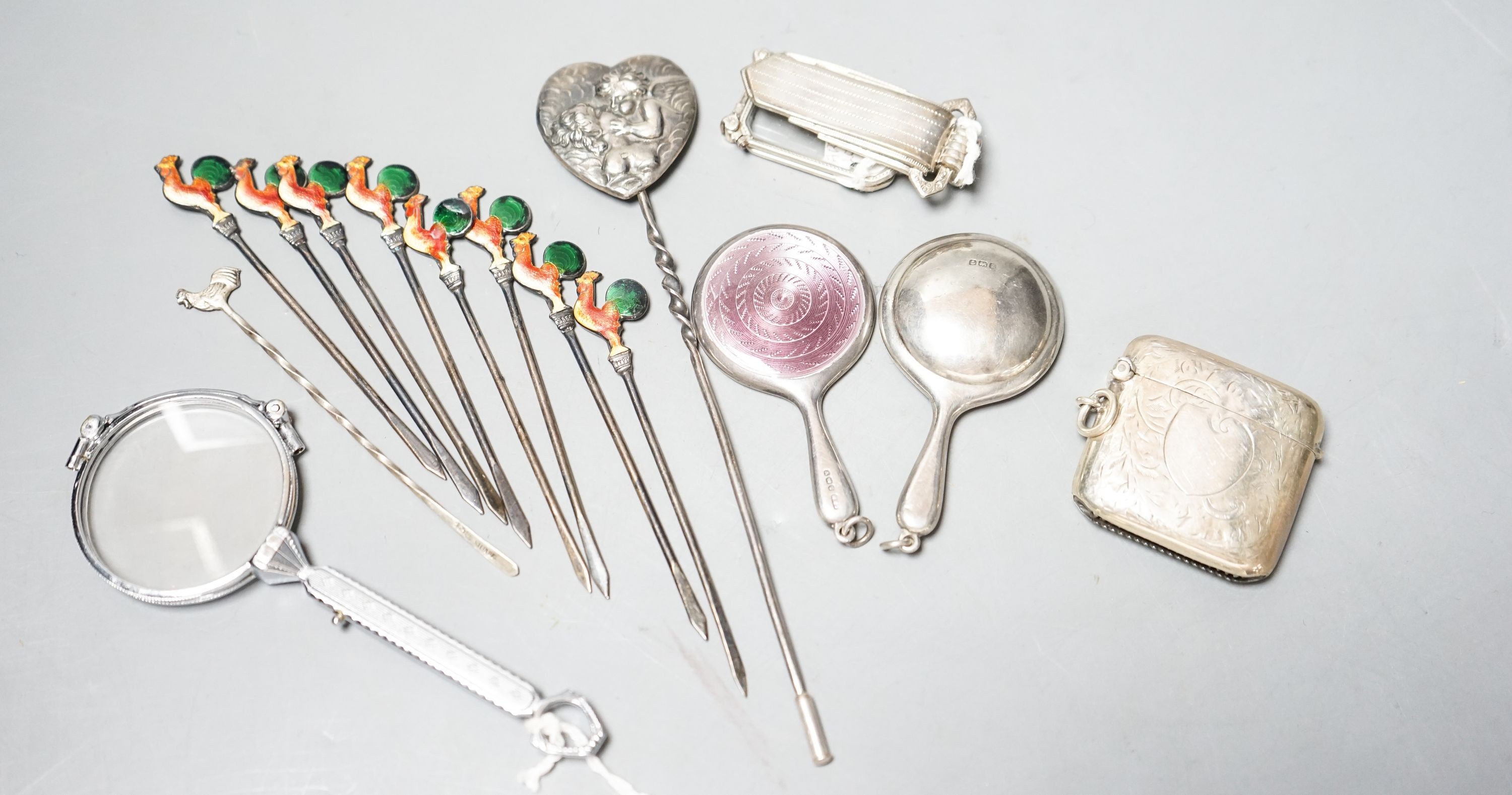 Small silver and white metal including enamelled handbag mirror and one other, a vesta case enamelled cocktail sticks, two metal lorgnettes etc.